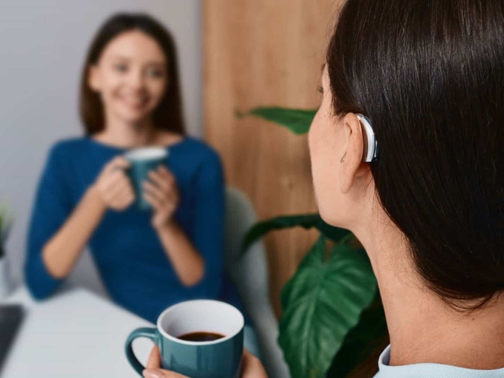 Woman wearing a receiver-in-canal hearing aid — one of several hearing aid styles available at Hear Today Hearing Aids in Corpus Christi, TX